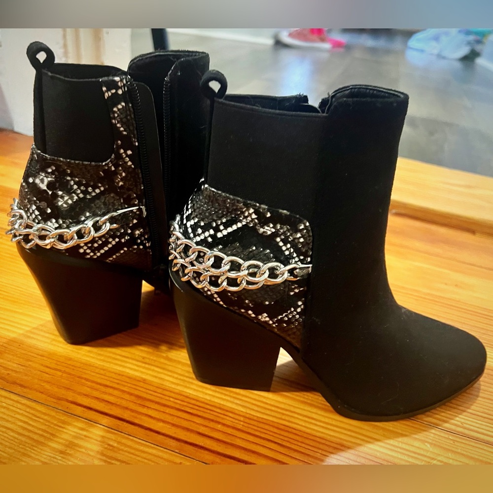 Worn once: multi texture black bootie with chain detail